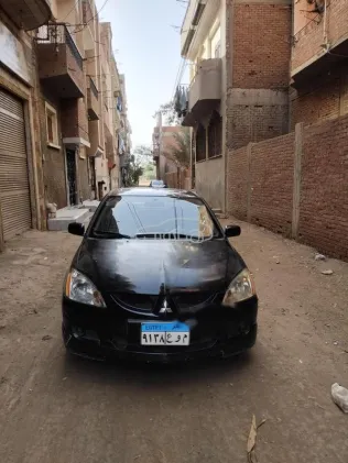ميتسوبيشي لانسر بومة 2004 أسود مستعملة للبيع