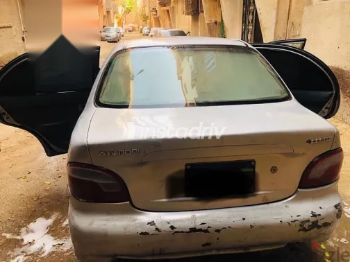 هيونداي اكسنت 2006 فضي مستعملة للبيع - 9