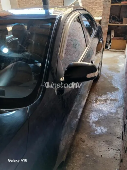 كيا سيراتو 2010 أسود مستعملة للبيع - 2