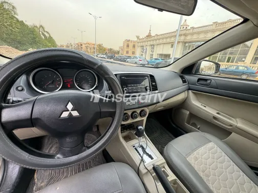 ميتسوبيشي لانسر 2016 أبيض مستعملة للبيع - 4