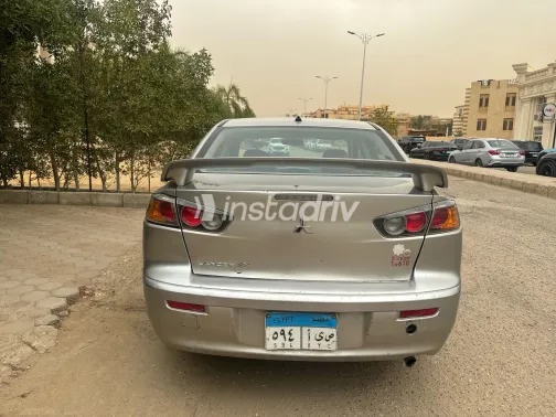 ميتسوبيشي لانسر 2016 أبيض مستعملة للبيع - 5