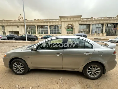 ميتسوبيشي لانسر 2016 أبيض مستعملة للبيع - 8