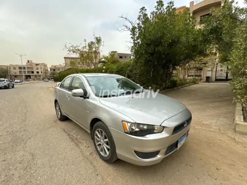 ميتسوبيشي لانسر 2016 أبيض مستعملة للبيع - 9