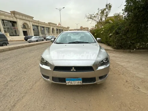 ميتسوبيشي لانسر 2016 أبيض مستعملة للبيع - 10