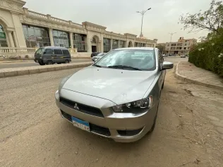 ميتسوبيشي لانسر 2016 أبيض مستعملة للبيع