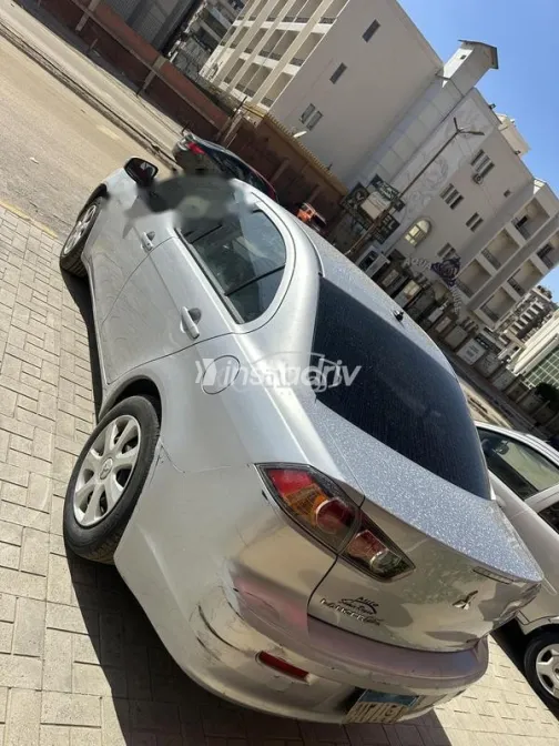 ميتسوبيشي لانسر 2015 فضي مستعملة للبيع - 2