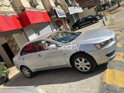 ميتسوبيشي لانسر 2015 فضي مستعملة للبيع - 3