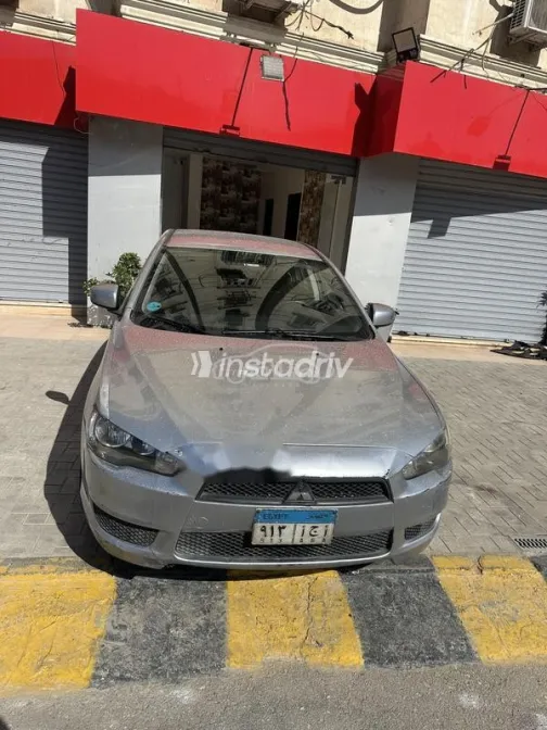 ميتسوبيشي لانسر 2015 فضي مستعملة للبيع - 5