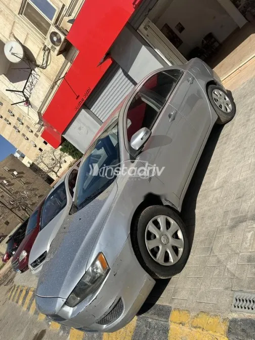 ميتسوبيشي لانسر 2015 فضي مستعملة للبيع - 6