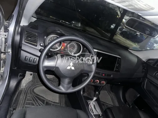 ميتسوبيشي لانسر 2015 فضي مستعملة للبيع - 7