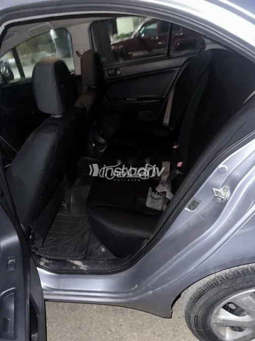 ميتسوبيشي لانسر 2015 فضي مستعملة للبيع - 8