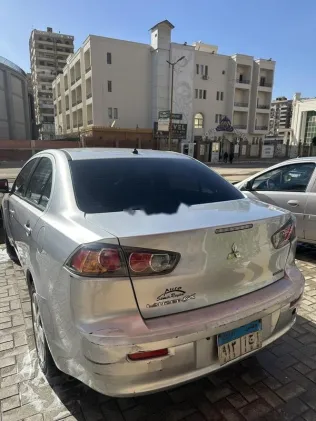 ميتسوبيشي لانسر 2015 فضي مستعملة للبيع