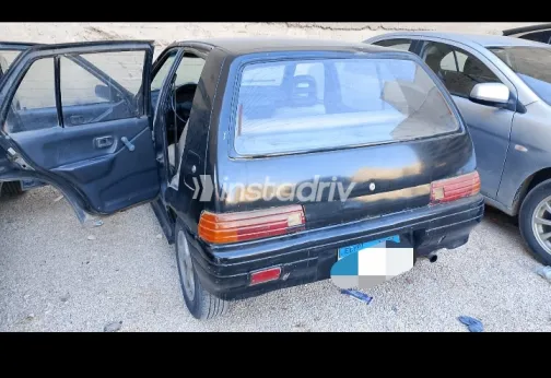 دايهاتسو شاريد 1992 أبيض مستعملة للبيع - 8