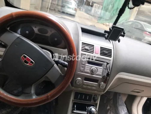 جيلي امجراند 7 2014 أبيض مستعملة للبيع - 5