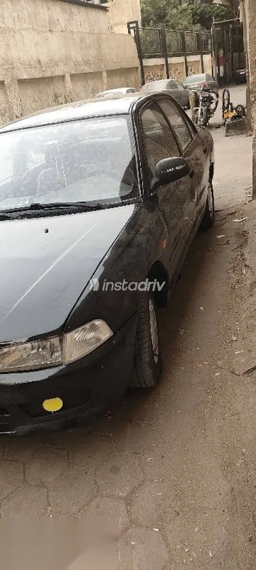 ميتسوبيشي لانسر 1993 أسود مستعملة للبيع - 1