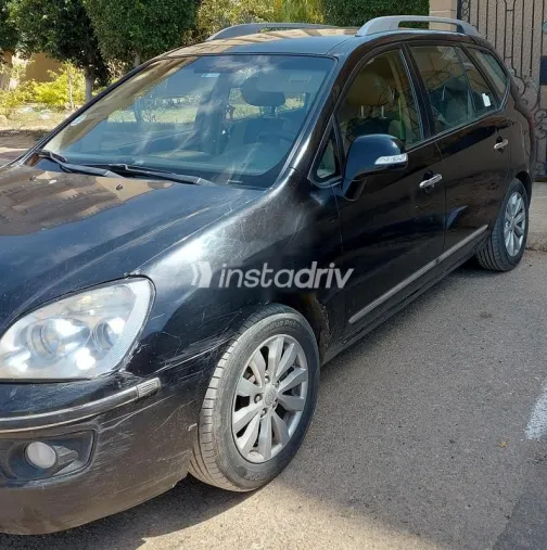 كيا كارينز 2012 أسود مستعملة للبيع - 4