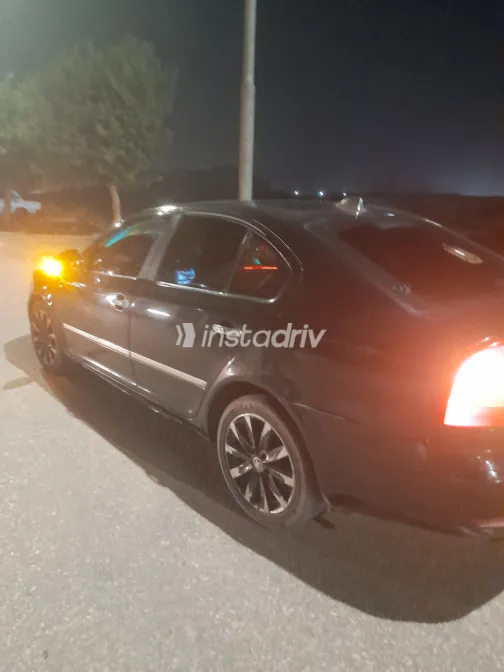 سكودا فانتازيا 2010 أبيض مستعملة للبيع - 4