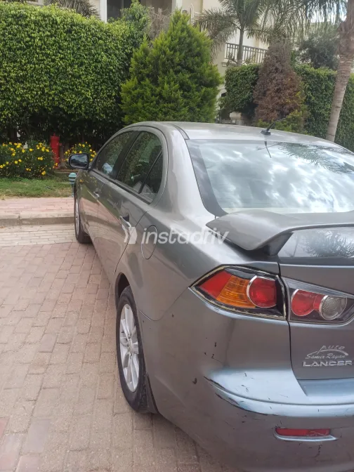 ميتسوبيشي لانسر 2015 أبيض مستعملة للبيع - 3