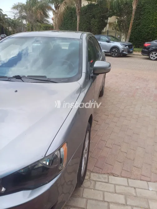 ميتسوبيشي لانسر 2015 أبيض مستعملة للبيع - 4