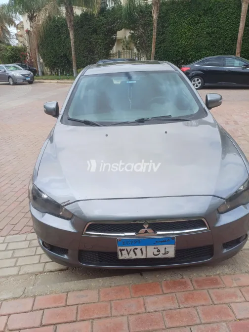 ميتسوبيشي لانسر 2015 أبيض مستعملة للبيع - 7