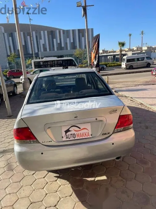 ميتسوبيشي لانسر 2007 فضي مستعملة للبيع - 2