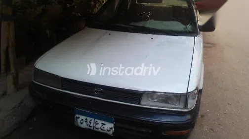 تويوتا كورولا 1991 أبيض مستعملة للبيع - 7