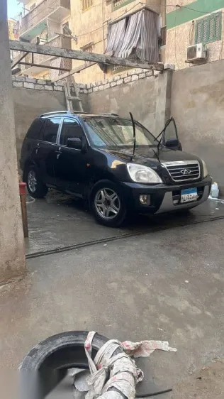 شيرى تيجو 2010 أسود مستعملة للبيع