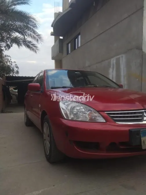 ميتسوبيشي لانسر بومة 2013 أحمر مستعملة للبيع - 5