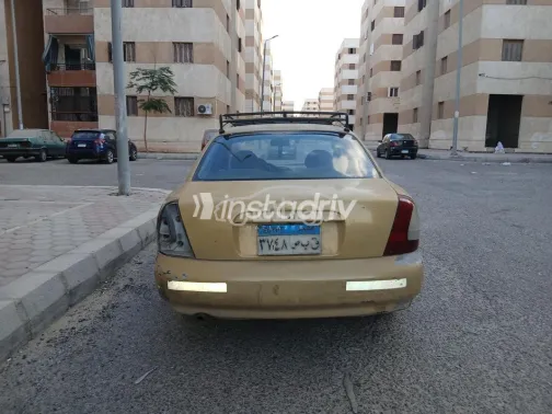 دايو نوبيرا 1 1997 برونزي مستعملة للبيع - 2