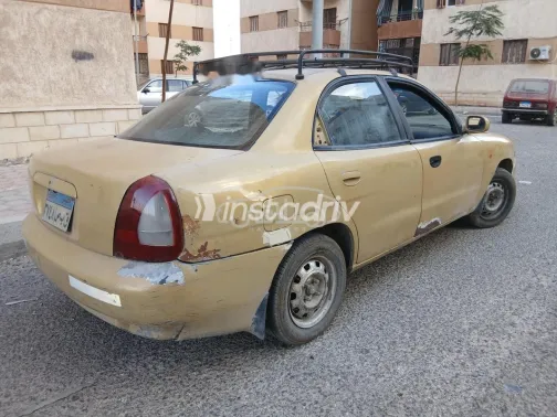 دايو نوبيرا 1 1997 برونزي مستعملة للبيع - 3