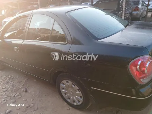 نيسان صنى 2011 أسود مستعملة للبيع - 1