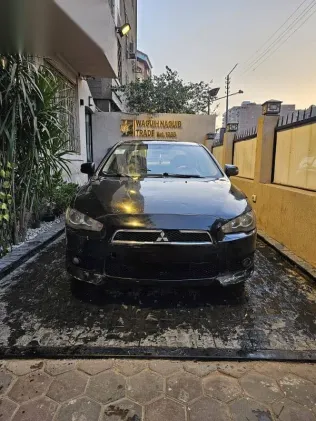 ميتسوبيشي لانسر 2016 أسود مستعملة للبيع