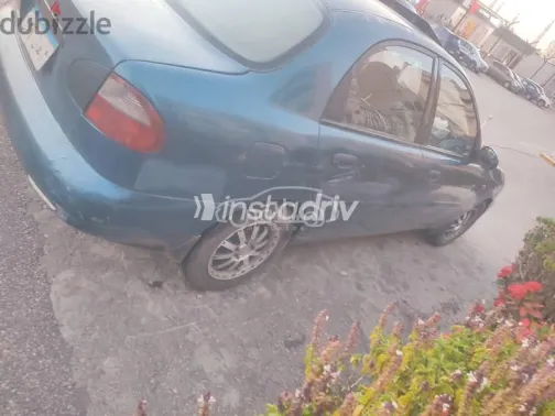 دايو لانوس 1999 أزرق غامق مستعملة للبيع - 4