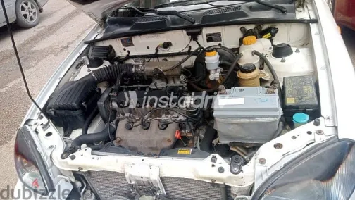 دايو لانوس 2004 أبيض مستعملة للبيع - 2