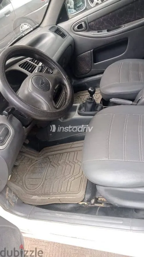 دايو لانوس 2004 أبيض مستعملة للبيع - 5