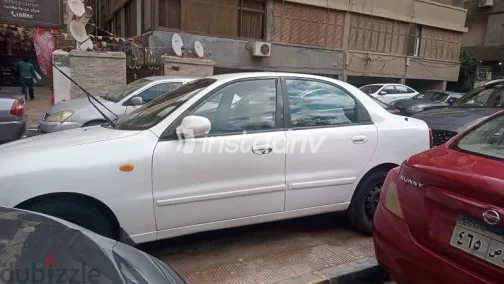 دايو لانوس 2004 أبيض مستعملة للبيع - 7