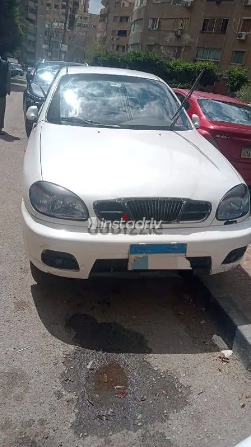 دايو لانوس 2004 أبيض مستعملة للبيع - 9