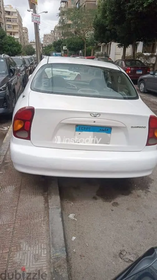 دايو لانوس 2004 أبيض مستعملة للبيع - 10