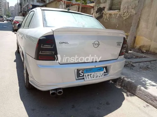 اوبل أسترا 2004 أبيض مستعملة للبيع - 5