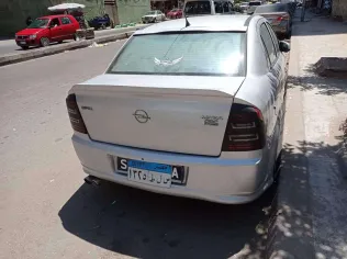 اوبل أسترا 2004 أبيض مستعملة للبيع