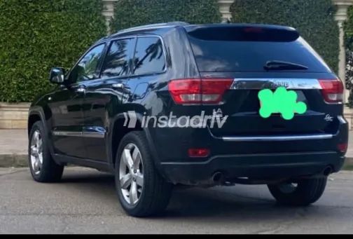 جيب جراند شيروكي 2013 أبيض مستعملة للبيع - 3