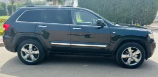 جيب جراند شيروكي 2013 أبيض مستعملة للبيع