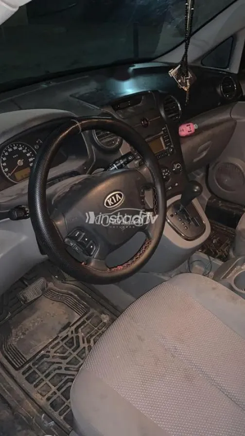 كيا كارينز 2011 أسود مستعملة للبيع - 7