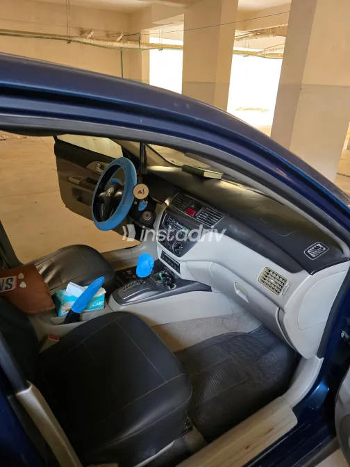 ميتسوبيشي لانسر بومة 2007 أبيض مستعملة للبيع - 3