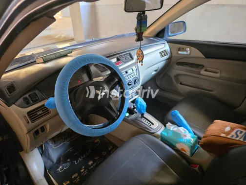 ميتسوبيشي لانسر بومة 2007 أبيض مستعملة للبيع - 9