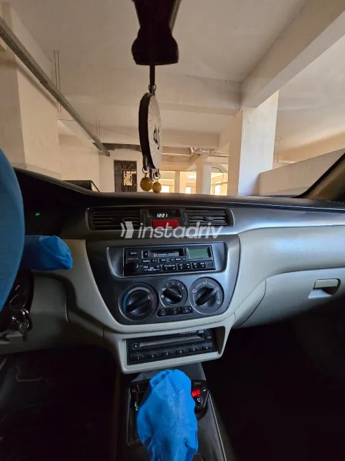 ميتسوبيشي لانسر بومة 2007 أبيض مستعملة للبيع - 10