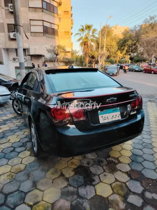 شيفروليه كروز 2010 أسود مستعملة للبيع - 4