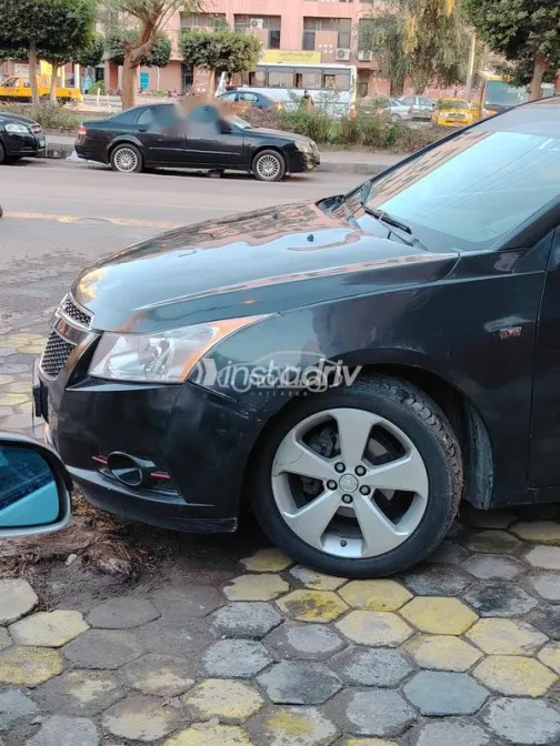 شيفروليه كروز 2010 أسود مستعملة للبيع - 8