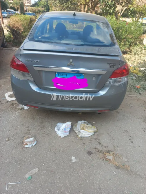 ميتسوبيشي اتراج 2015 أبيض مستعملة للبيع - 3