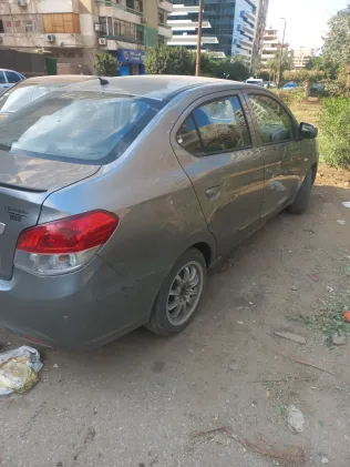 ميتسوبيشي اتراج 2015 أبيض مستعملة للبيع